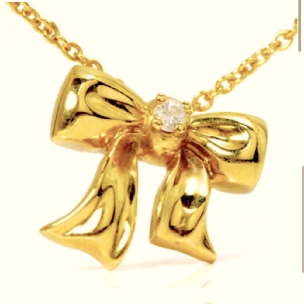 Retired Tiffany and Co. 18K Bow & Tiffany Diamond! - Picture 1 of 6